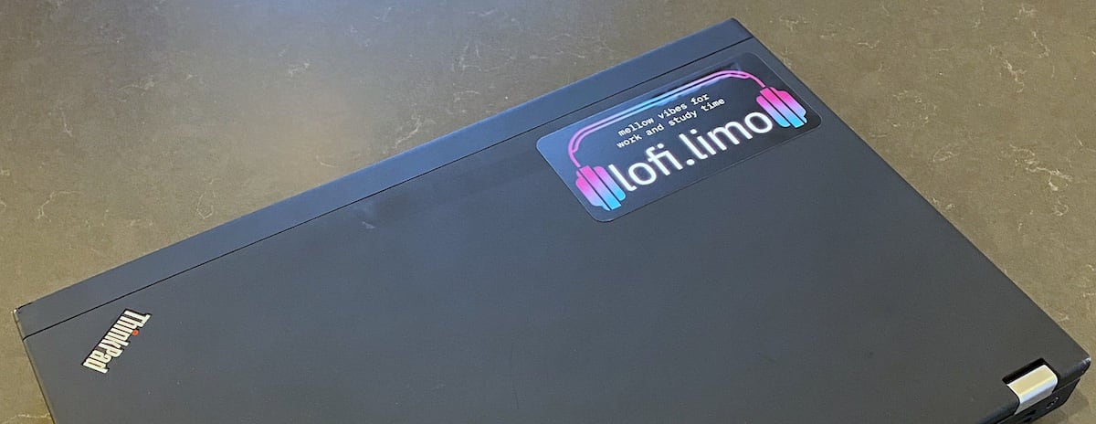 A lofi.limo sticker looks simply magnificent adhered to the corner
	of a slightly worn ThinkPad x220 laptop.